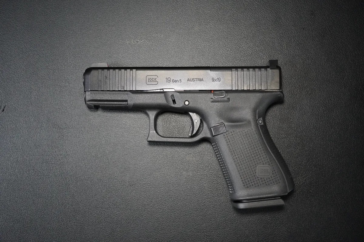 Glock 19 Gen 5 9x19 on a dark work surface